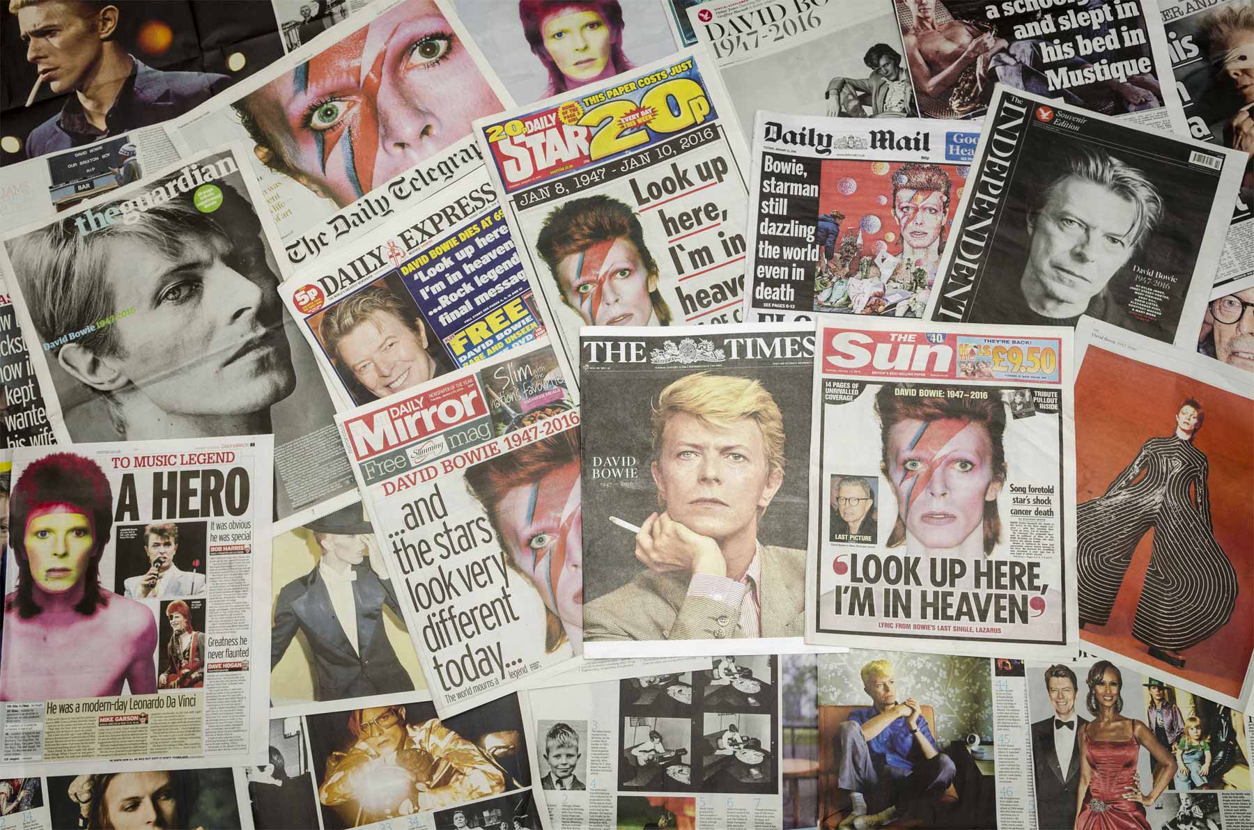 A mess of tabloids featuring David Bowie on the cover.