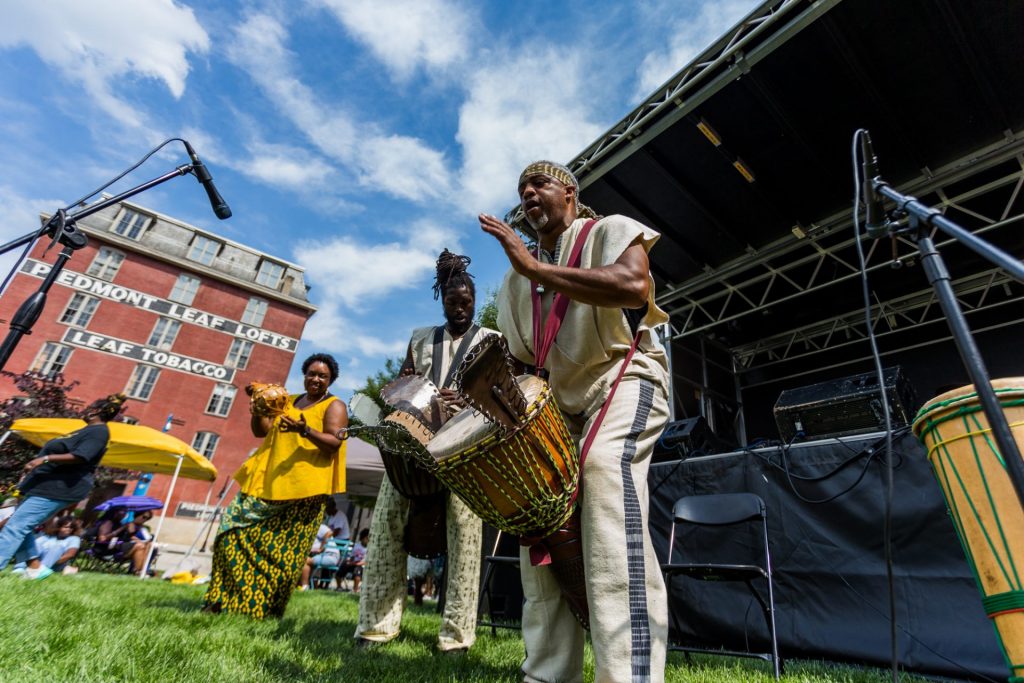 performers playing drums at juneteenth festival