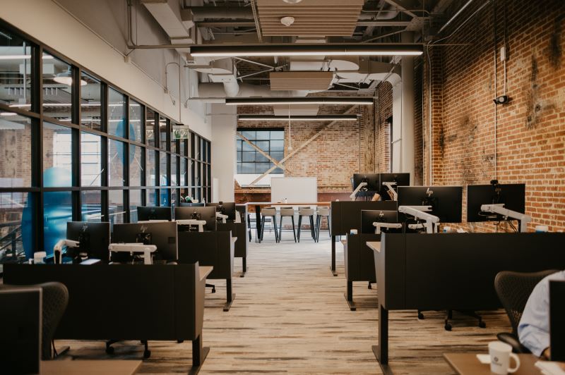 Desks, monitors, and and flexible work areas in Sparq coworking space